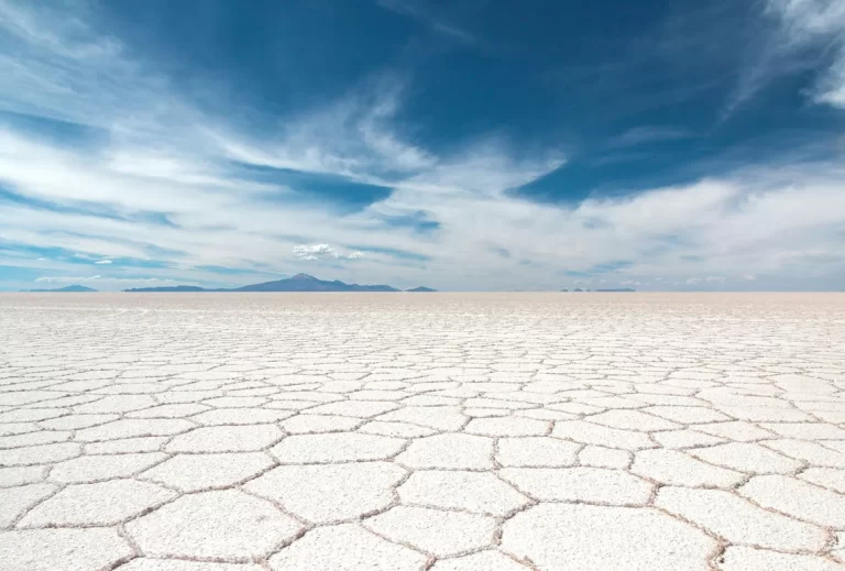 Salt flat with polygonal salt formations on the Salar de Uyuni in Bolivia