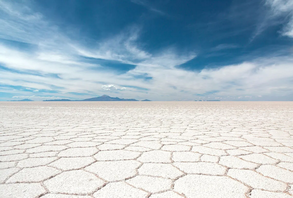 Salt flat with polygonal salt formations on the Salar de Uyuni in Bolivia